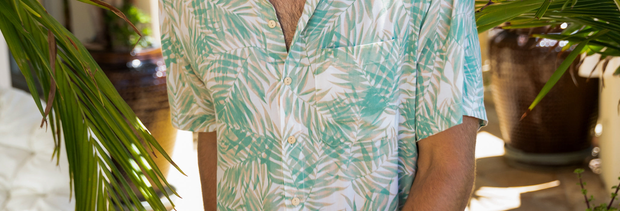 men, women, and kids green fronds vacation outfits
