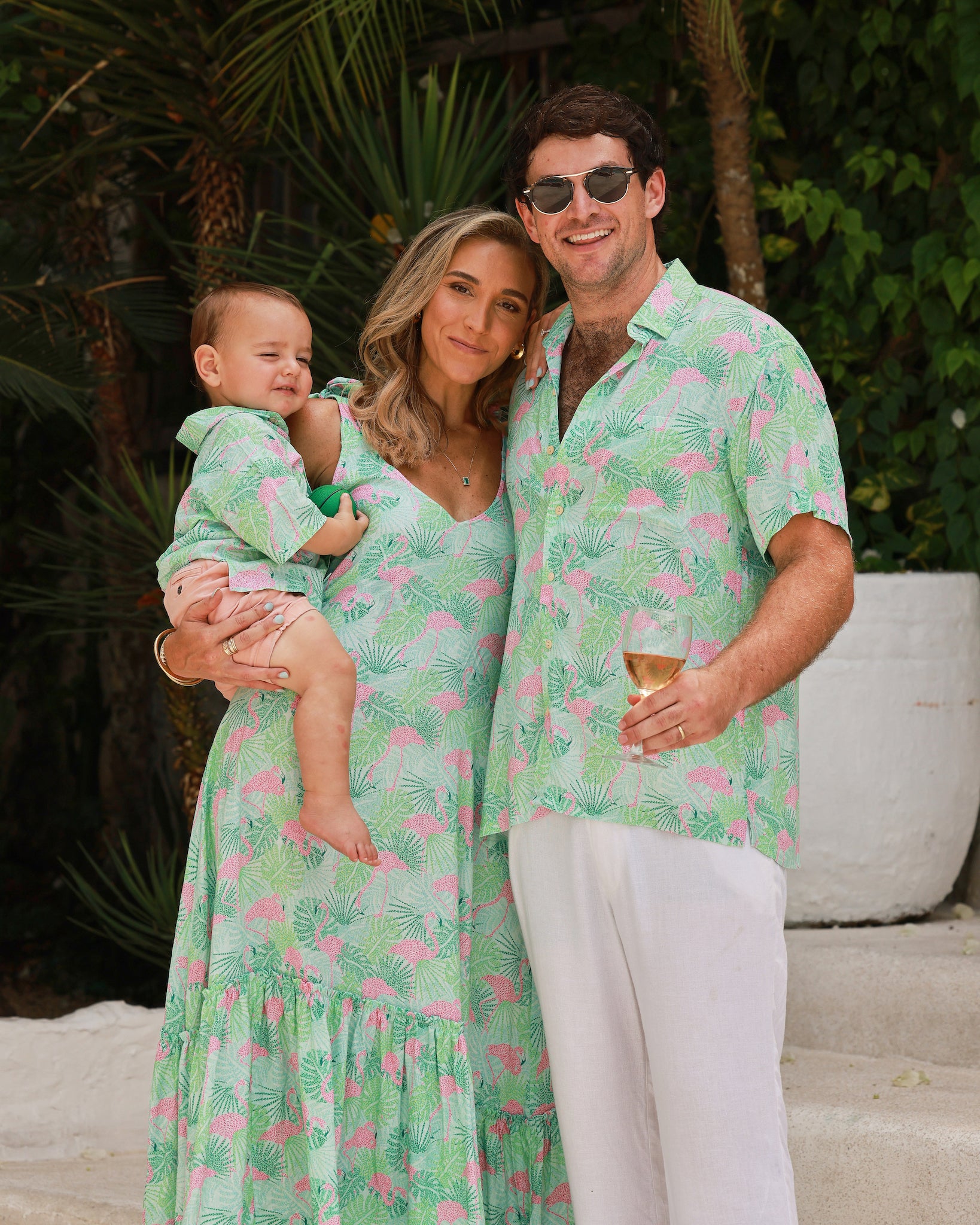 Kenny Flowers sunshine state boys short sleeve button down green and pink flamingo hawaiian shirt
