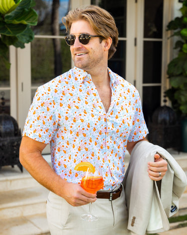 Kenny Flowers The Seaside Spritz mens white button down short sleeve hawaiian shirt, orange aperol spritz print, destination wedding guest outfits
