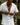 man wearing a high quality terry button down shirt by the best brand for mens resort wear kenny flowers