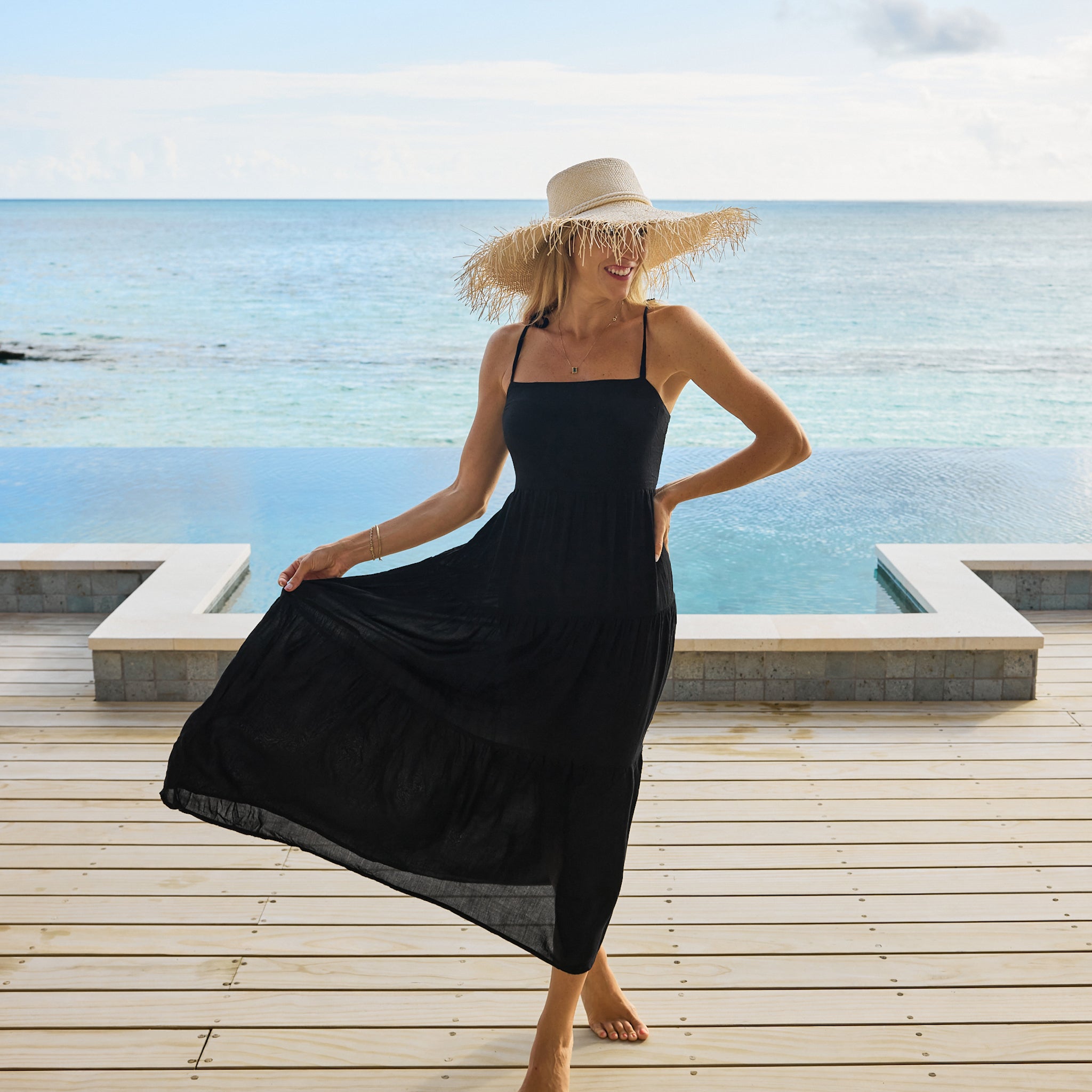 The Solid Black Resort Dress by Kenny Flowers The Perfect Black Maxi