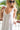 Kenny Flowers womens white linen vacation dress with flower trim