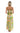 A woman viewed from behind wearing a strapless tiered maxi dress with a colorful tropical and geometric pattern in green, orange, pink, and yellow on a white background.