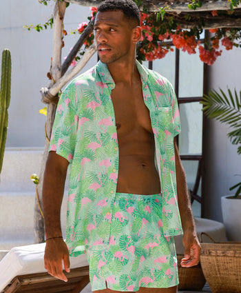 Kenny Flowers Sunshine State mens performance lining green and pink flamingo swim trunks