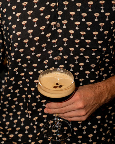Kenny Flowers mens short sleeve button down espresso martini hawaiian shirt the buzz around town