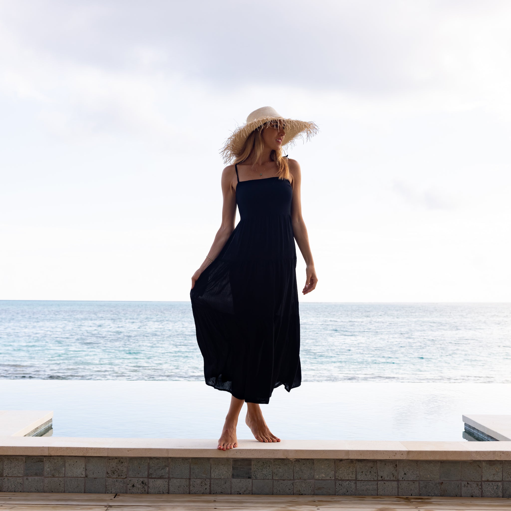 The Solid Black Resort Dress by Kenny Flowers | The Perfect Black Maxi The Solid Black Resort Dress by Kenny Flowers | The Perfect Black Maxi