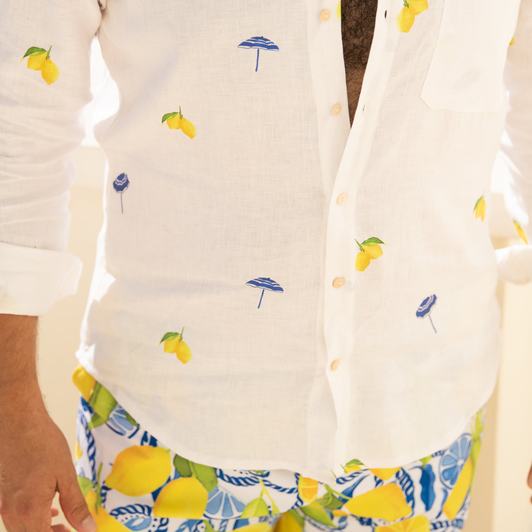 Mens long sleeve 100% white linen button down shirt, lemons and fontelina umbrellas
