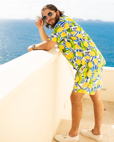 Mens yellow lemon swim trunks and short sleeve button down hawaiian shirt cabana set