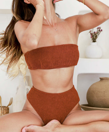 The Papagayo Luxe Crinkle Stretch High Waist Bikini Bottom from the Kenny Flowers Costa Rica Collection. Womens swimwear that is effortless, earthy-toned and made from super stretchy, flattering, stress-free crinkle luxe fabric.
