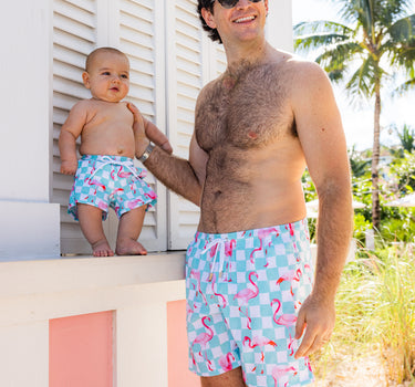 Kenny Flowers swim trunks, matching father son boys and men's vacation swimwear with flamingoes